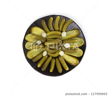 Pickled sliced cucumbers, fermented food, marinated canned vegetables, gherkins, pickles 127999983