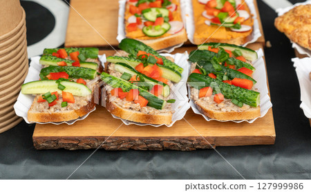Polish traditional sandwiches with lard, bell pepper and fresh cucumbers Polish traditional sandwiches with lard, bell pepper and fresh cucumbers 127999986