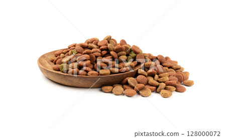 Dry pet food, dog color kibble pile, puppy meat and vegetable pellets, canine protein granules Dry pet food, dog color kibble pile, puppy meat and vegetable pellets, canine protein granules 128000072