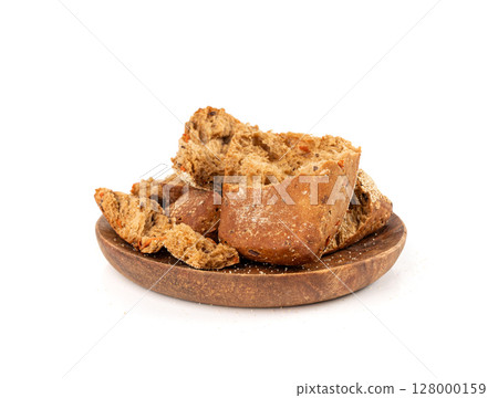 Broken wheat brown bread pieces isolated, fitness pumpkin carrot buns with seeds, cereal bread 128000159
