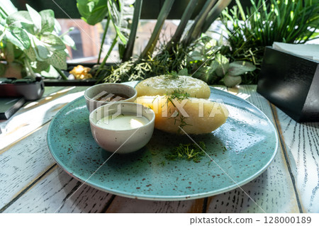 Lithuanian potato dumplings, cepelinai pancakes or kolduny, meat stuffed draniki, traditional didzkukuliai Lithuanian potato dumplings, cepelinai pancakes or kolduny, meat stuffed draniki, traditional didzkukuliai 128000189
