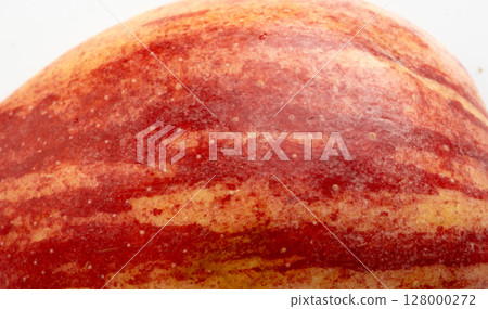 Red apple skin macro texture. Honeycrisp fruit surface close up, fresh spotted and striped apple 128000272