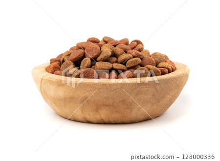 Dry pet food, dog color kibble pile, puppy meat and vegetable pellets, canine protein granules Dry pet food, dog color kibble pile, puppy meat and vegetable pellets, canine protein granules 128000336