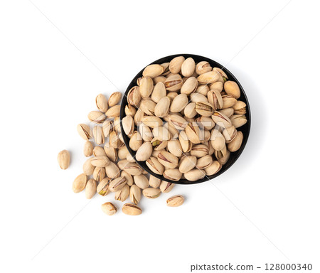 Fried salt pistachio nuts isolated. Baked pistachios pile, roasted green pistache fruit in shell on white 128000340