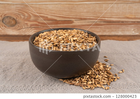 Milk thistle seeds, silybum marianum grains, dry blessed milkthistle fruits, variegated thistle kernels Milk thistle seeds, silybum marianum grains, dry blessed milkthistle fruits, variegated thistle kernels 128000423