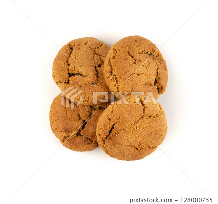Chocolate cookies with chocolate filling isolated, brown round biscuits, broken sweet cocoa pastry Chocolate cookies with chocolate filling isolated, brown round biscuits, broken sweet cocoa pastry 128000735