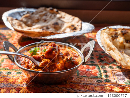 Butter paneer masala. Cottage cheese curry, hot spicy chicken korma, traditional indian food Butter paneer masala. Cottage cheese curry, hot spicy chicken korma, traditional indian food 128000757