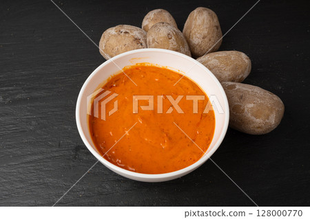 Red mojo rojo and green mojo verde sauces, traditional Tenerife dips, mojo picon dressing Red mojo rojo and green mojo verde sauces, traditional Tenerife dips, mojo picon dressing 128000770