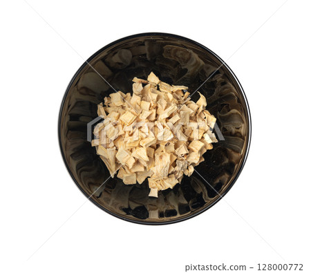 Dry parsley root, dried diced celery cubes, scattered small liquorice pileces, dry vegetable 128000772