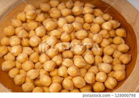 Soaked chickpeas, chick pea in water, swollen wet Cicer arietinum fruits, garbanzo beans cooking Soaked chickpeas, chick pea in water, swollen wet Cicer arietinum fruits, garbanzo beans cooking 128000798