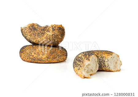 Broken Poppy Seed Bagel Isolated, Round Bread Bun, Poppyseed Wheat Bakery Pieces for Breakfast Broken Poppy Seed Bagel Isolated, Round Bread Bun, Poppyseed Wheat Bakery Pieces for Breakfast 128000831