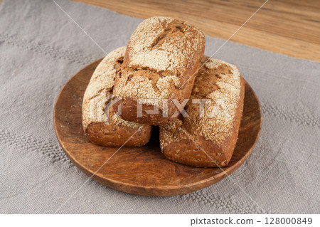 Whole wheat brown bread, fitness pumpkin carrot buns with seeds, cereal bread grain bun 128000849