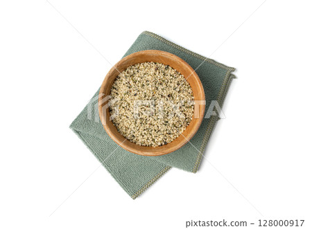 Shelled hemp seeds pile isolated, peeled cannabis grains, marijuana kernels without peel Shelled hemp seeds pile isolated, peeled cannabis grains, marijuana kernels without peel 128000917