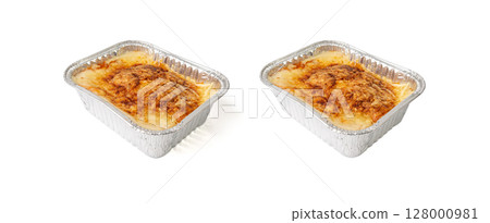 Lasagna portion in aluminium foil tray isolated. Oven baked lasagne for heating, container, airplane food Lasagna portion in aluminium foil tray isolated. Oven baked lasagne for heating, container, airplane food 128000981