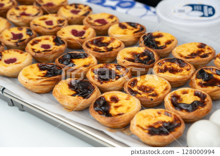 Pastel de nata Portuguese cakes. Traditional Portugal egg tart, fresh pasteis bakery 128000994