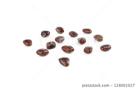 Dried tamarind seeds isolated, Tamarindus indica beans on a white background, medicine ingredient Dried tamarind seeds isolated, Tamarindus indica beans on a white background, medicine ingredient 128001027
