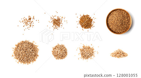 Raw Buckwheat Pile Isolated, Dry Buck Wheat Grains, Russian Kasha Heap Raw Buckwheat Pile Isolated, Dry Buck Wheat Grains, Russian Kasha Heap 128001055