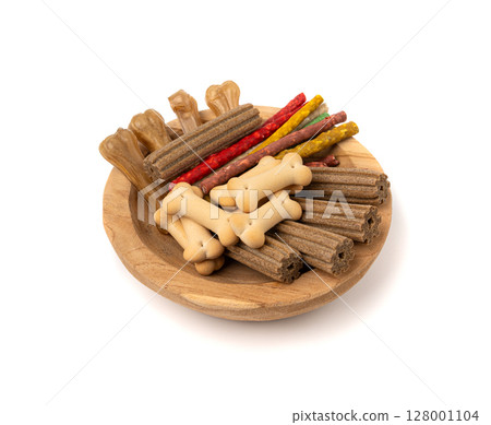 Assorted dog kibble, many canine food, different color dry pet food mix, various dog snack pile 128001104