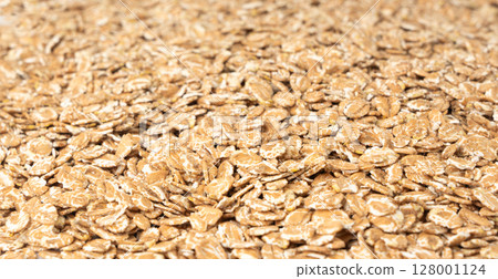 Spelt flakes isolated, dry raw rolled flat oat grains, wheat, oatmeal or bran, barley rye cereals 128001124
