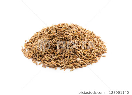 Cumin seed isolated. Caraway or fennel dry seeds close up, zeera macro, Indian cumin or zira grains 128001140