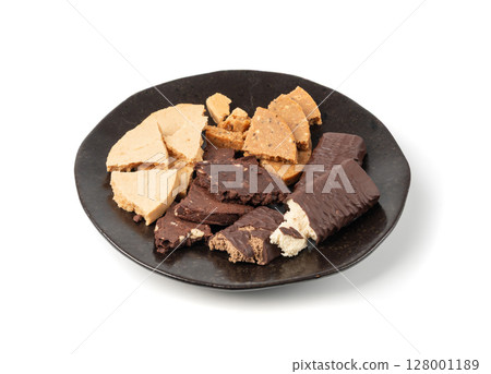 Protein cookie isolated, broken round energy snack with peanuts, chicory fibre 128001189
