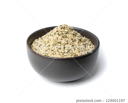 Shelled hemp seeds pile isolated, peeled cannabis grains, marijuana kernels without peel 128001197