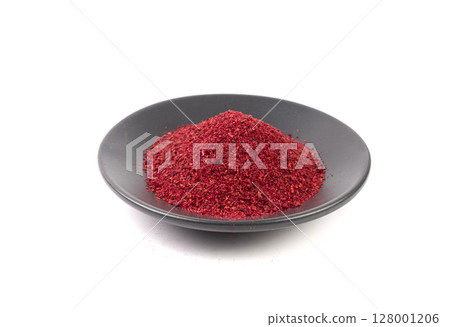 Sumac Powder Isolated, Red Sumach Ground Seasoning, Dry Sumak, Crushed Typhina Seeds 128001206