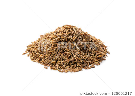 Cumin seed isolated. Caraway or fennel dry seeds close up, zeera macro, Indian cumin or zira grains 128001217