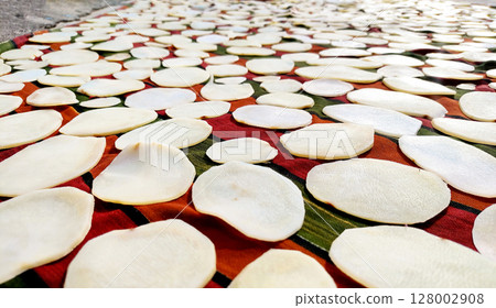 Homemade Sun Drying Potato Slices for Chips Homemade Sun Drying Potato Slices for Chips 128002908