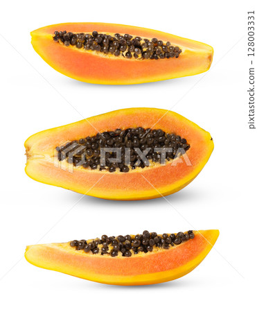 Collection of ripe papaya halves and a slice with seeds isolated. Half of papaya fruit with clipping path. 128003331