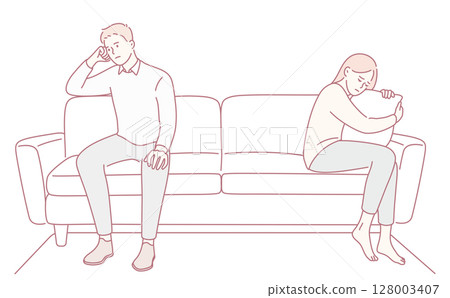 A couple is sitting on the couch, showcasing underlying tension and emotional distance between them A couple is sitting on the couch, showcasing underlying tension and emotional distance between them 128003407