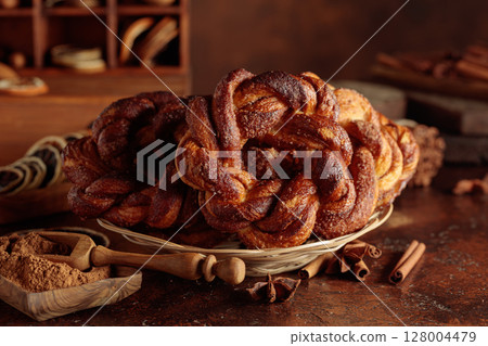 Traditional Scandinavian soft pretzels with cinnamon and sugar. 128004479