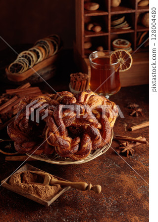 Traditional Scandinavian soft pretzels with cinnamon and sugar. 128004480