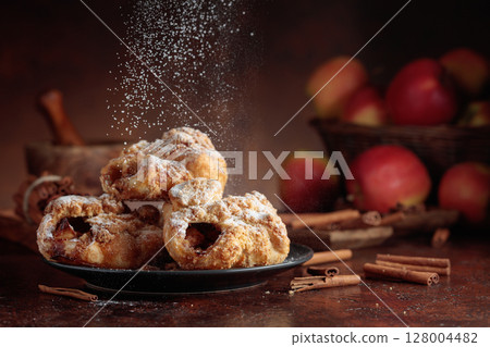 Homemade mini apple strudels with apples and cinnamon. Homemade mini apple strudels with apples and cinnamon. 128004482