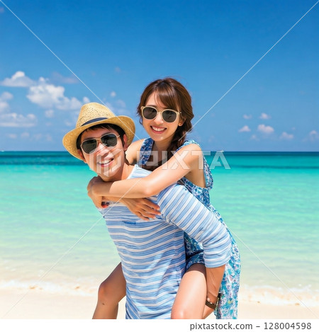 Couple wearing sunglasses and carrying each other on the beach 128004598