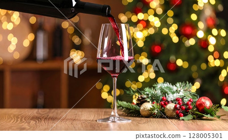 Two glasses of wine, champagne, and a bottle on a table ready for a celebration dinner party Two glasses of wine, champagne, and a bottle on a table ready for a celebration dinner party 128005301
