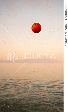 Family enjoys sunset beach fun with a vibrant ball in flight Family enjoys sunset beach fun with a vibrant ball in flight 128006668
