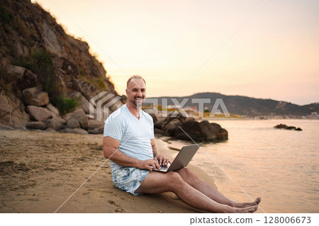 Enjoying a calm evening by the shore with work and laughter 128006673