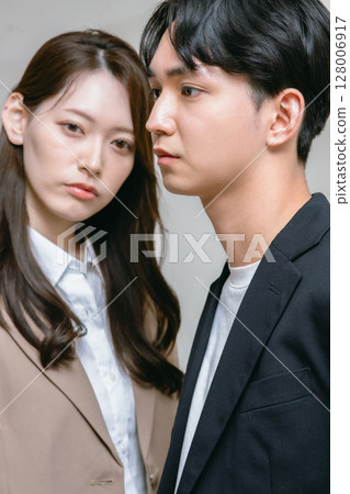 Men and women with serious expressions Men and women with serious expressions 128006917