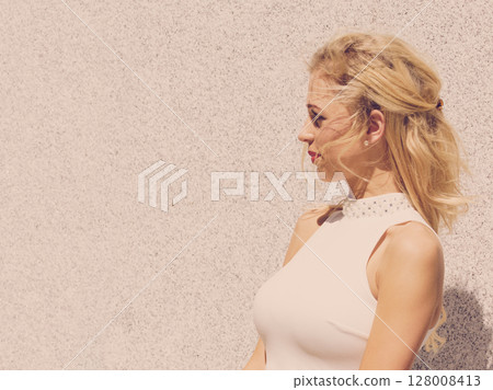 Fashionable woman in city Fashionable woman in city 128008413
