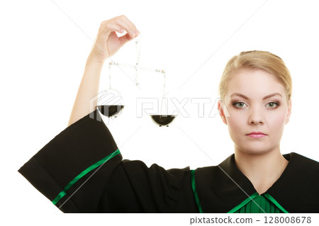 woman barrister holding scales. 128008678