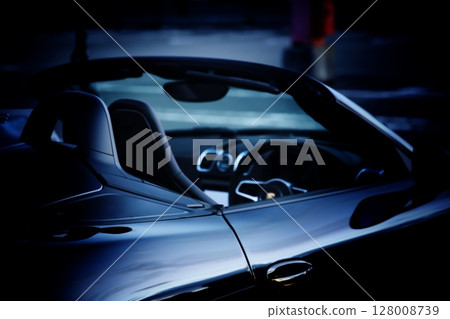 shiny black open car shiny black open car 128008739