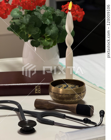 Interfaith Spiritual Support with Bible, Singing Bowl, and Stethoscope 128009106
