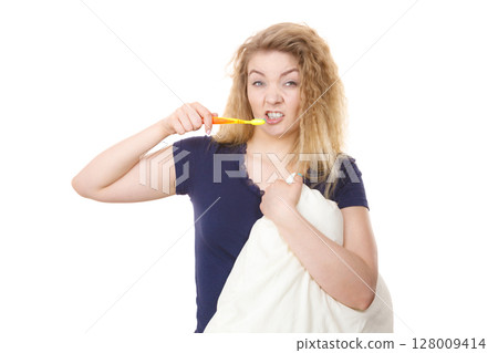 Sleepy woman hugging white pillow 128009414