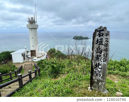 The monument and lighthouse at the northernmost point of Ishigaki Island 128010798