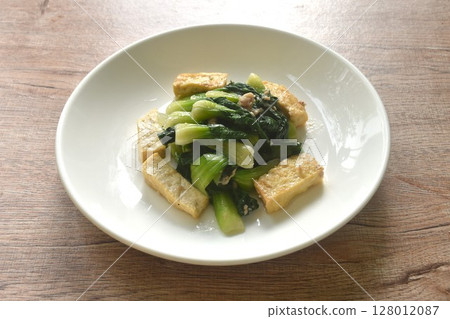 stir fried Chinese cabbage with slice tofu and chop pork in soy sauce on plate stir fried Chinese cabbage with slice tofu and chop pork in soy sauce on plate 128012087