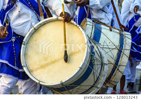 Musicians with their rustic wooden drums 128013243