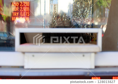 Cash department window closeup. Money exchange 128013827