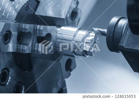 The CNC lathe machine milling process on metal shaft parts by flat nose end mill tool. The CNC lathe machine milling process on metal shaft parts by flat nose end mill tool. 128015053