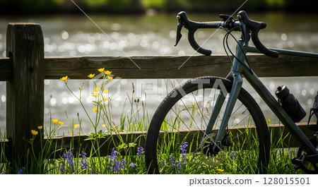 Road bike at a fence 128015501